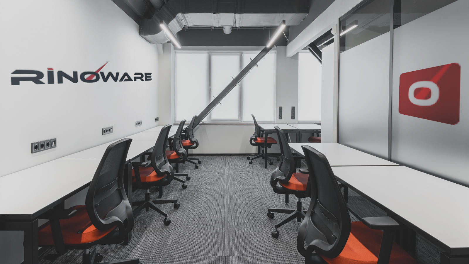 Glimpse Office showing Glimpse Neon logo and Stairs with cushions